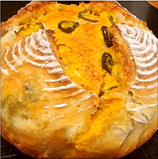 Sliced blueberry lemon and jalapeño cheddar sourdough loaves